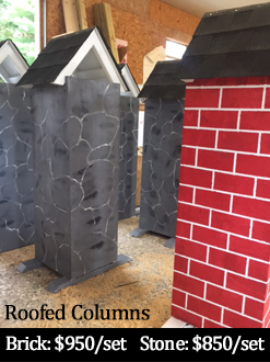 Roofed columns horse jumps in brick and stone patterns
